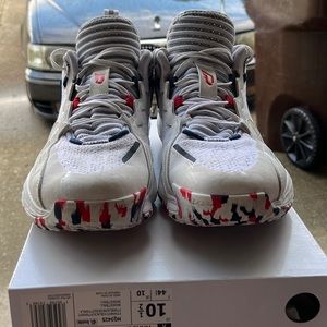 Used dames basketball shoes size 10 white red and blue color way